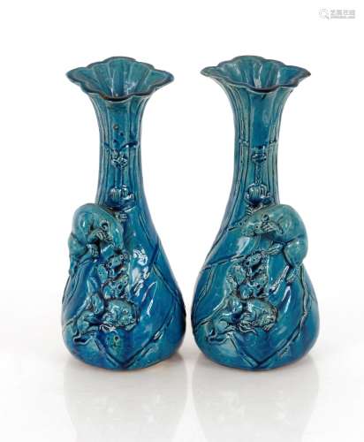 A pair of blue glazed Japanese baluster vases, decorated wit...