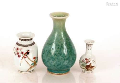 Two Chinese baluster vases, decorated exotic birds and scrip...