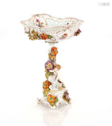 A continental porcelain table centre piece, comprising baske...