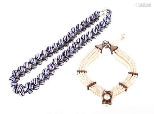 A silver and pearl necklace; together with a blue and white ...