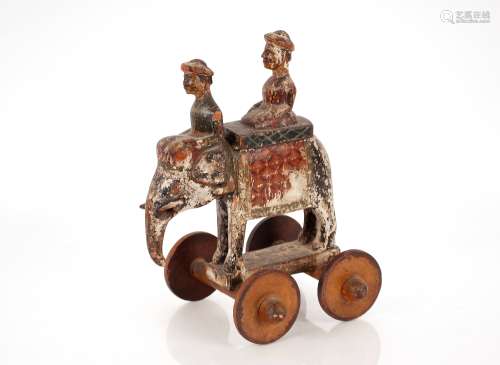 A 19th Century pull-a-long toy, in the form of an elephant a...