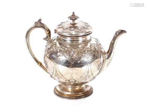 A Victorian silver teaset, by The Barnards, foliate embossed...