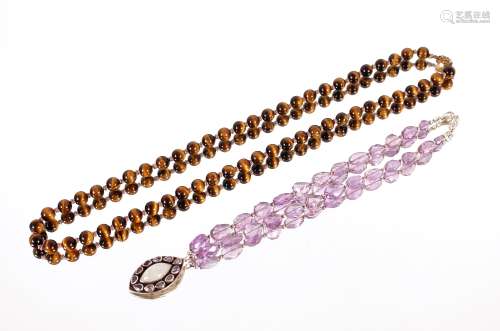 An agate necklace with gold clasp; together with an amethyst...