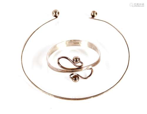 A heavy Scandinavian silver Art Nouveau bangle; together wit...