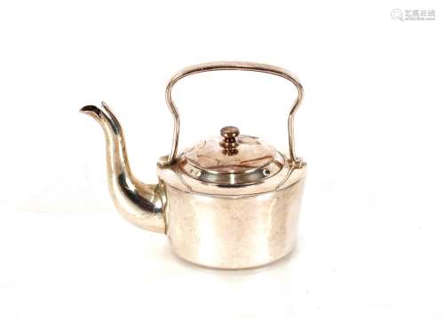 A continental white metal miniature kettle, 8cm high