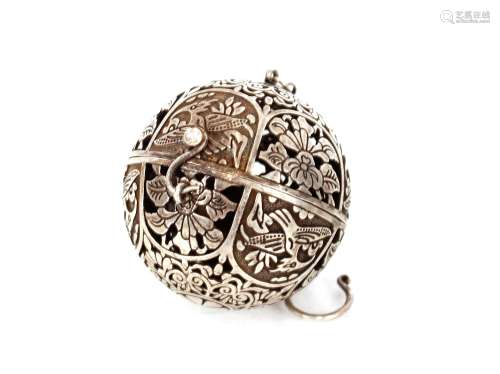 A Chinese white metal ball shaped censer, having pierced fol...