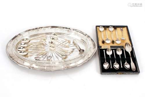 An oval silver plated dish, with glass liner; and various si...