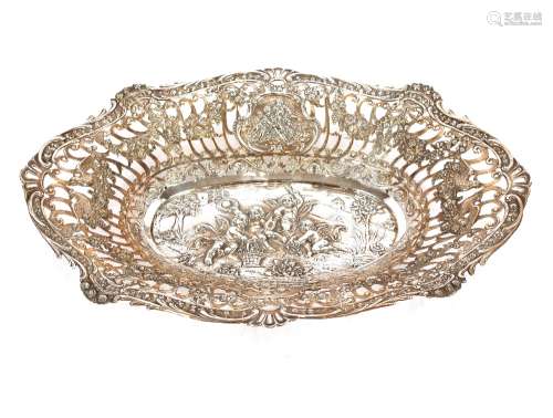 An ornate continental bread basket, with pierced foliate and...