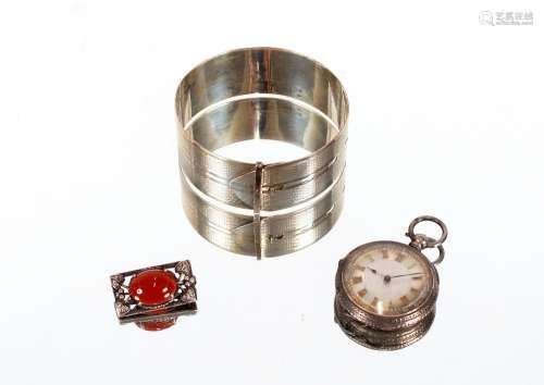 A silver bangle; a silver fob watch AF; and a silv