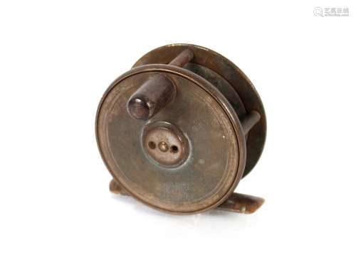 A brass Hardy fishing reel, 6.4cm dia. overall