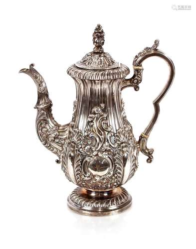 A George III silver coffee pot, of baluster shape with rich ...