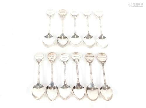 Eleven named silver presentation teaspoons