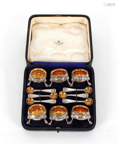 A cased set of six silver salts, having raised foliate decor...