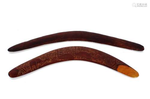 Two vintage Australian boomerangs of typical form, one with ...
