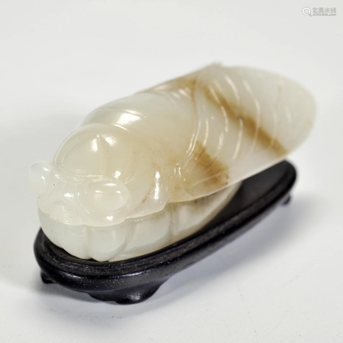 A Carved White and Russet Jade Box Qing Dynasty