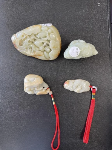GROUP OF FOUR CHINESE WHITE JADE PIECES