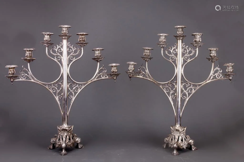 PAIR OF SILVER PLATED SEVEN-LIGHT CANDELABRA