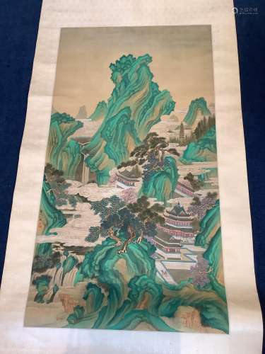 A Chinese scroll painting on silk of pavilions amid rocks an...