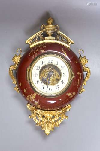 A French pottery and gilt metal cartel timepiece, height 38c...