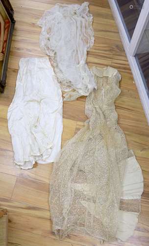 A 1930's lace and satin wedding dress including net veil