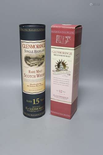 Two bottles of Glenmorangie, one being a Millenium Malt