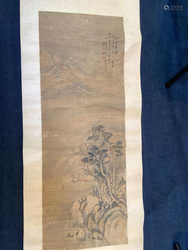 A Chinese scroll painting on paper of a river landscape scen...