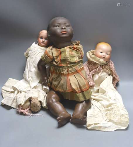 A black bisque-headed doll, German KB-M 5 bent limb with a s...