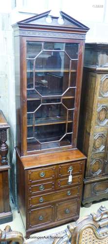 An early 20th century George III style narrow mahogany bookc...