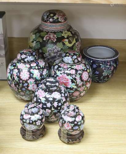 Six Chinese famille rose jars and a jardiniere