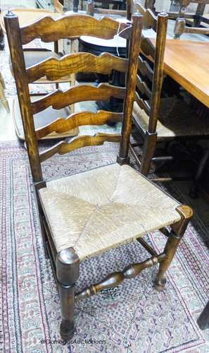 A set of four 18th century style ash rush seat ladderback di...