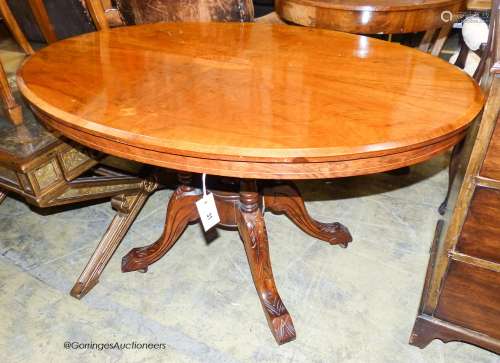 A late Victorian walnut tilt top oval breakfast table, width...