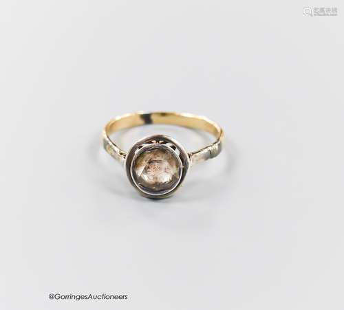 An antique continental yellow metal and solitaire rose cut d...