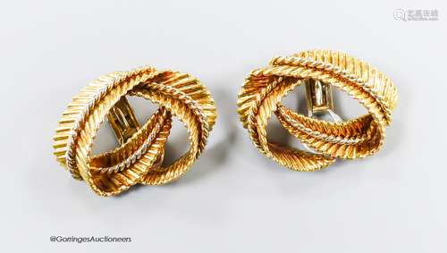 A pair of textured 750 yellow metal 'fern knot' ear clips, 2...