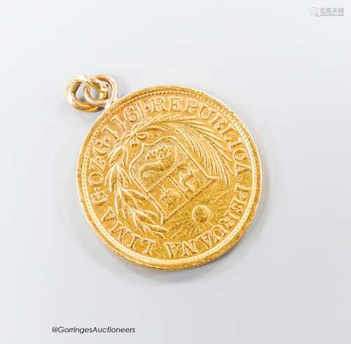 A 1911 Peruvian gold coin, now mounted as a pendant, 8.2 gra...