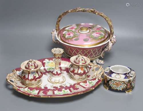 A 19th century English porcelain inkstand, a basket and asso...