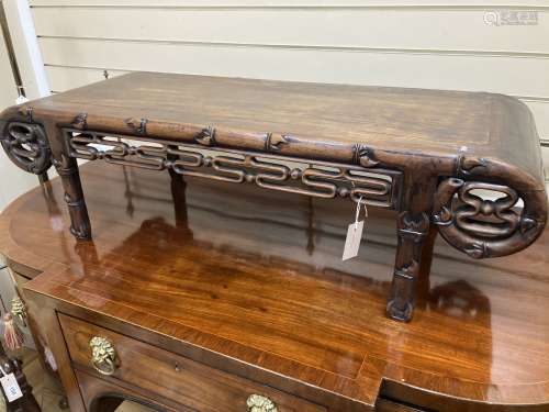 A Chinese carved hardwood low occasional table. W-110, D-44,...