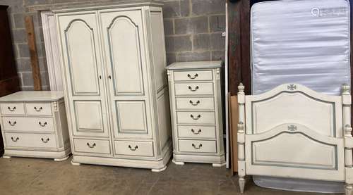 A French provincial style bedroom suite, cream painted, with...