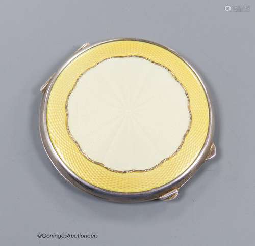 A George VI silver and yellow guilloche enamel circular comp...