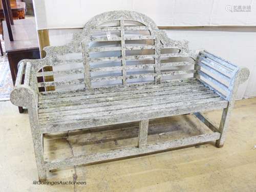 A weathered teak Lutchens style garden bench, length 166cm, ...