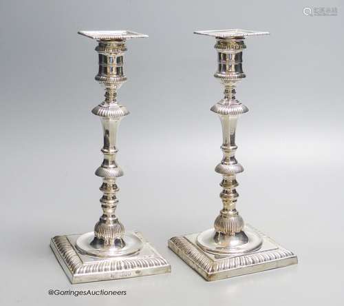 A pair of late Victorian 18th century style candlesticks, wi...