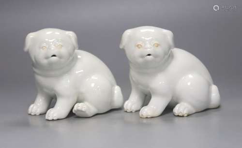 Two Japanese Hirado models of seated puppies, 19th century, ...
