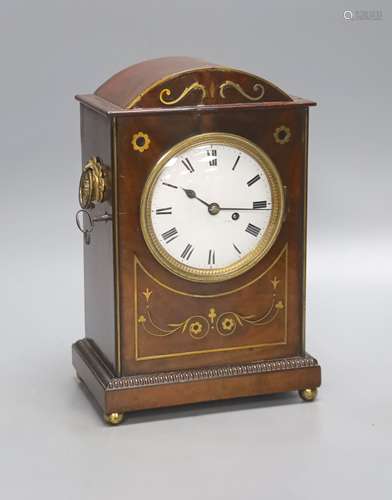 A George IV brass inlaid mahogany mantel clock, with keys an...