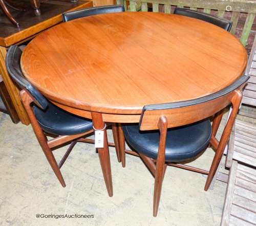 A teak and leatherette Fresco dining suite by Wilkins for G ...