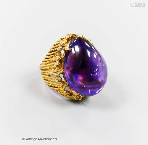 A pierced 585 yellow metal and large cabochon amethyst set d...