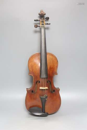 A cased violin and bow