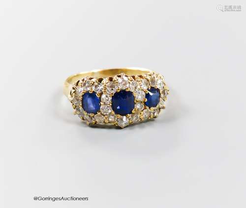 A late Victorian yellow metal, sapphire and diamond set trip...