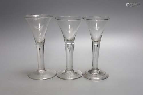 Three Georgian drawn trumpet ale glasses, tallest 17cmwith a...