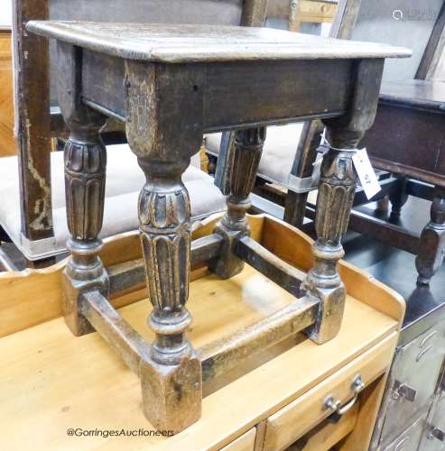 An Elizabethan style rectangular oak joint stool, width 43cm...