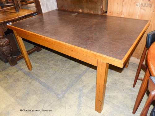 A mid century design Moss & Co rectangular oak writing table...
