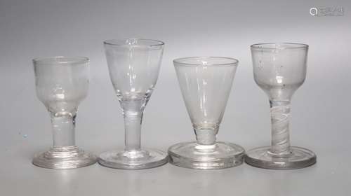 Four Georgian 'Toast Master' glasses, one with opaque twist ...